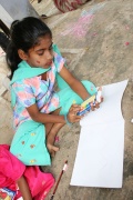 colores and paper were the gift for the performing children