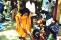 Padma Venkataraman distribut some snackes to the students