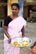 Jayalakshmi serves snacks