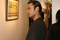 Visitor being impressed by the Bindu paintings