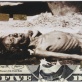 A starving woman bedded on a  five Dollar note, covered with gold leaf