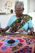 Lakshmiammal working on her Bindu art