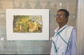 Damodaran in front of his painting -  photo by Ian Watkinson