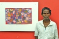 Subramani and his painting