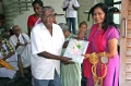 Vadivel hand over the present from the students to Padma