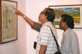 Guests looking at the art works