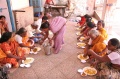 Students getting their meal in the Sarthak Mana Kushtashram