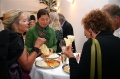 Guests enjoying the Indian food after the opening