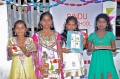 Girls from Bharathapuram getting presents for their performance