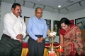 Padma Venkataraman lighting the lamp