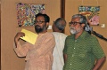 Dr. Dilip Mitra with a senior Artist
