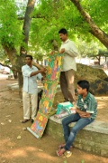 Story teller with a painting-roll