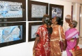 The new students see their work the first time framed on a wall.