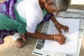 Lakshmiamal draw with pencils