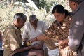 Mr. & Mrs. Raman distribute fruits to the patients .JPG