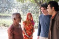 Navneet & werner talk to the coordinator of the colony