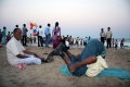 Subaih makes Yoga on the beach .JPG