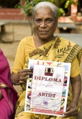 Rani showing her diploma
