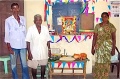 Uday Kumar, Vadivel and Uma in front of the Bindu-class temple