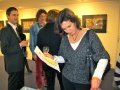 A guest searching for paintings on the desk