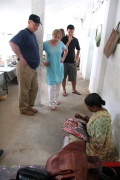 Becky Douglas and volunteers watching Godavari painting