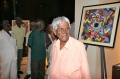 Eswaran proud in front of his painting