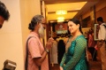 N. Ramachandran, artist and Bindu trustee, chating before the auction starts
