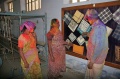 Bindu Students looking at the handmade clothes by the members of the Kushthashram