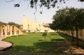 Viewing the Hawa Mahal behind a beautiful garden