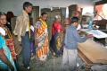 Students watching the finishing of cardboard boxes