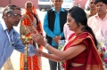 Padma lighting a candle