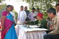 Munusamy and Kumar painting at the workshop