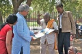 Vadivel explaining his artwork to Suresh Kaul and Padma