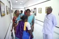 students watching their paintings