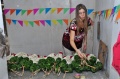 Dagmar preparing flower girlands