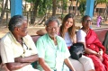 Dagmar Vogl with Bindu artists Ravichandran, Krishnamurti and Malagai waiting for the bus at the Vivekananda Kendra