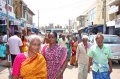 Bindu artists walking through the bazar