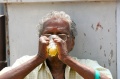 Ravichandran enjoying his sugarcane refreshing drink