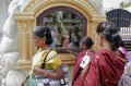 Godavari Sundari and Radha gazing at Jesus