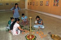 Art Students preparing the lighting of lamps and presents for the Bindu-Students