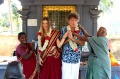 Dagmar and Werner getting girlands from Sundari and Rani