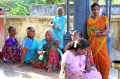 Students with the secretary of Anbu Thondu Niliam, the old age home for people effected by leprosy leprosy