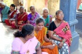 Bindu-students listening to the priest