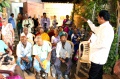 The politician Mr. C. E. Sathya talking to the students